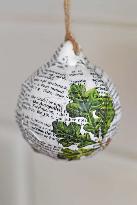 Did you know that according to the Cambridge University Dictionary, UPCYCLING is the word of the year for 2019? To celebrate this I thought I would upcycle an actual dictionary and make some decoupaged Christmas baubles with vintage images. I have already made an upcycled dictionary advent calendar which you can see here.  It may seem odd to upcycle a dictionary, but they do go out of date and most people use google rather than a dictionary these days. Also dictionary's can prove to b… Upcycled Baubles, Diy Toothbrush Holder, Easy Upcycle, Word Of The Year, Christmas Decoupage, Beautiful Baubles, Terracotta Flower Pots, Free Vintage Printables, Diy Entryway