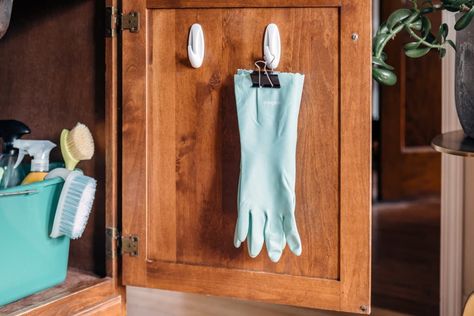 dishgloves hanging on a cabinet door on a command hook Organize Under Kitchen Sink, Binders Organization, Kitchen Cabinet Organization Layout, Glove Storage, Glass Cleaning Solution, Dish Gloves, Home Kitchen Organization, Organizing Documents, Kitchen Organizing Ideas