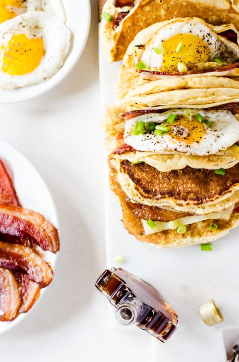 American breakfast tacos... Light and fluffy pancakes act as a vehicle for thick slices of bacon, melted cheese, and fried eggs. Smother the whole thing in maple syrup and you have the best breakfast ever! Roasted Tomato Salsa Recipe, Pancake Tacos, Fried Egg Breakfast, Breakfast Food Truck, Breakfast Tacos Recipe, Light And Fluffy Pancakes, Avocado Salsa Recipe, Fun Breakfast, Pancakes And Bacon