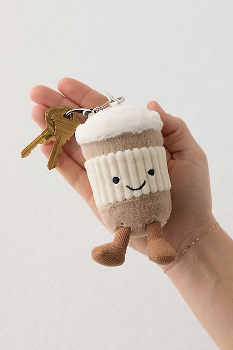 Leap to class and fetch good vibes with this animal-shaped plushie keychain. Made from plush polyester, this Jellycat keychain features a few of our fave creatures. Topped with a hinge clip to easily attach to your backpack, purse or keys! Features Plushie keychain by Jellycat Finished with embroidered detailing Ready to carry with a metal hinge clip at the top Content + Care 100% Polyester Hand wash Imported Size Dimensions: 3.25" dia x 3.25" h Weight: 0.1 lbs | Jellycat Animal Plushie Bag Char Jellycat Sun Bag, Jelly Cat Keychain, Jellycat Keychain, Aesthetic Keys, Jellycat Keychain On Bag, Plushie Bag, Keychains Plush, Jellycat Bunny Keychain, Plushie Keychain