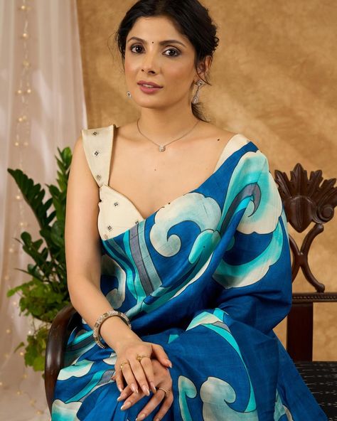 Discover the beauty and luxury of this Vibrant Blue Pure Silk Hand Batik Saree. Made with pure silk and featuring hand batik artwork, this saree is a stunning piece that exudes elegance and sophistication. Elevate your style with the softness and richness of pure silk, while making a statement with the intricate hand batik design. Perfect for any special occasion, this saree is a must-have for any fashion-forward individual. #sujatra #sujatraglobal #sujatrasarees #puresilksaree #handbatiksar... Batik Artwork, Batik Saree, New Blouse Designs, Batik Design, Saree Trends, Fancy Blouses, Fancy Blouse Designs, Pure Silk Sarees, Vibrant Blue