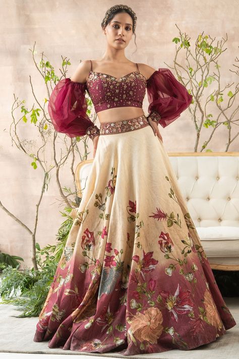 Featuring a multi colored lehenga in dola silk base with hand painting and floral print. It is paired with a matching embroidered corset blouse having puffed sleeves.    FIT: Fitted at bust and waist.  COMPOSITION: Dola silk.  CARE: Dry clean only. Lahanga Models, Hand Painted Lehenga, Painted Lehenga, Wedding Wear For Men, Lehenga Kurta, Embroidered Corset, 2025 Trends, Indian Bridesmaid Dresses, Simple Lehenga