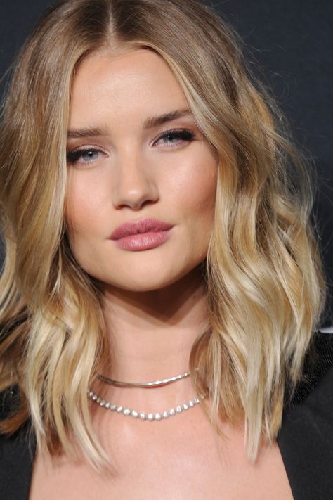 SHAG CUT There are undone waves and then there's model Rosie Huntington-Whiteley, whose shaggy, texturized hair is in a category of its own. Follow Rosie's lead and go for a subtle piece-y cut rather than dramatic layers, and copy her blonde ombre color if your hair is on the lighter side. Or, go a rich chocolate brown shade, which Lauren says adds a cool depth to the style. Teen Haircuts, Summer Haircuts, Hairstyles For Medium Hair, Rosie Huntington, Summer Hairstyles For Medium Hair, Huntington Whiteley, Rosie Huntington Whiteley, Long Bob, Hair Envy