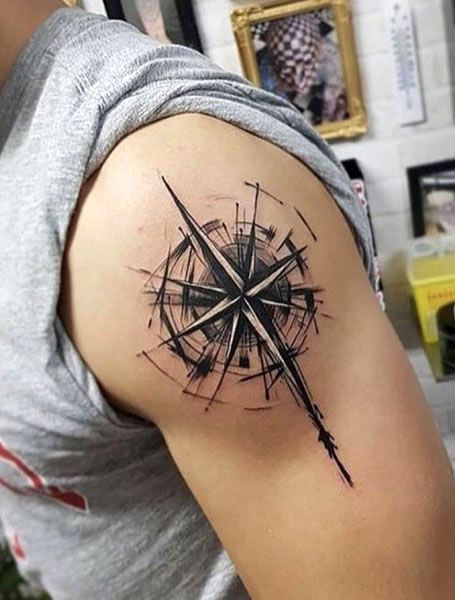 20 Cool Compass Tattoos For Men in 2021 - The Trend Spotter Compass Tattoos Arm, Viking Compass Tattoo, Compass Tattoo Meaning, Nautical Compass Tattoo, Tattoo Main, Compass Tattoo Men, Compass Tattoos, Compass Rose Tattoo, Cool Shoulder Tattoos