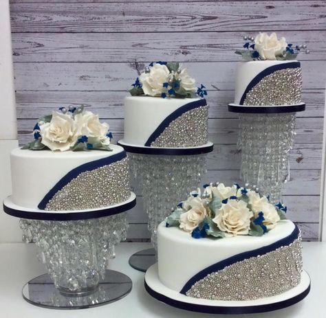 4 Tier Silver ball and navy blue wedding cake - Cake by Cakes o'Licious Navy Blue And Silver Birthday Cake, Navy Blue And Silver Wedding Cake, Blue Silver Wedding Cake, Blue And Silver Wedding Cake, Wedding Cake Designs Blue, Royal Blue Wedding Cakes, Royal Blue Cake, Blue And Silver Wedding, Navy Blue Wedding Cakes