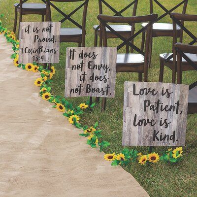 These rustic-inspired yard signs feature the verse from 1 Corinthians 13:4. Add them to wedding decorations to lead the way to the ceremony or reception or add them to the yard for an engagement party or rehearsal dinner. Printed on one side only. Plastic-coated cardstock. (3 pcs per set) 17 x 17 with 18 metal stakes. | Oriental Trading Company Love Is Patient Wedding Yard Sign in Black / White, Size 17.0 H x 17.0 W x 0.5 D in | Wayfair Burlap Aisle Runner Wedding, Burlap Aisle Runner, Wedding Yard, Outdoor Country Wedding, Sunflower Themed Wedding, Country Theme Wedding, Country Wedding Decorations, Wedding Vows Renewal, Future Wedding Plans