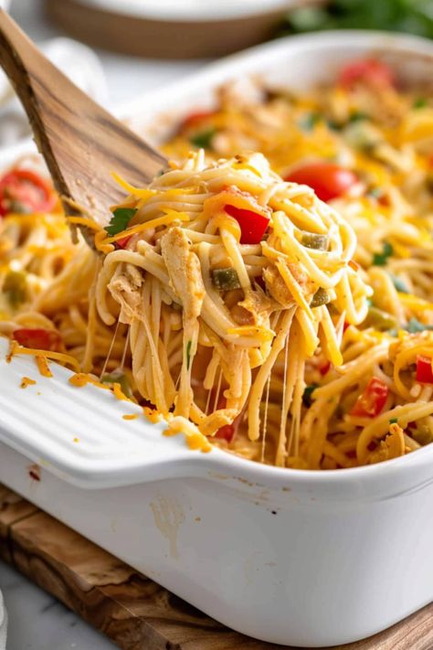 This hearty, cheesy chicken spaghetti casserole is pure comfort food. The tender chicken, creamy sauce, and gooey cheese make it a satisfying one-dish meal. Kim Insanely Good Recipes, Chicken Spaghetti Casserole, Cheesy Chicken Spaghetti, Canned Salmon Recipes, Chicken Pasta Dishes, Creamy Mushroom Soup, Spaghetti Casserole, Leftover Rotisserie Chicken, Chicken Spaghetti