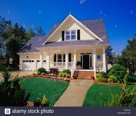 Small Two Story Yellow House with Black Shutters a Porch and Brick ... House With Black Shutters, Yellow House Exterior, Outside House Colors, Large Porch, White Exterior Houses, White Shutters, Brick Steps, Black Shutters, House Shutters