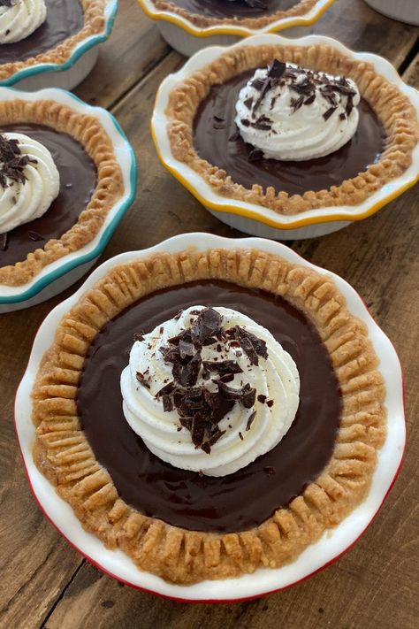 Mini Chocolate Cream Pies recipe from RecipeGirl.com #mini #miniature #chocolate #cream #pie #pies #dessert #recipe #RecipeGirl Mini Chocolate Cream Pies, Chocolate Cream Pies, Mini Chocolate Pie, Chocolate Cream Pie Recipe, Mini Pie Recipes, Chocolate Pie With Pudding, Mini Chicken Pot Pies, Cream Pies, Chocolate Cream Pie