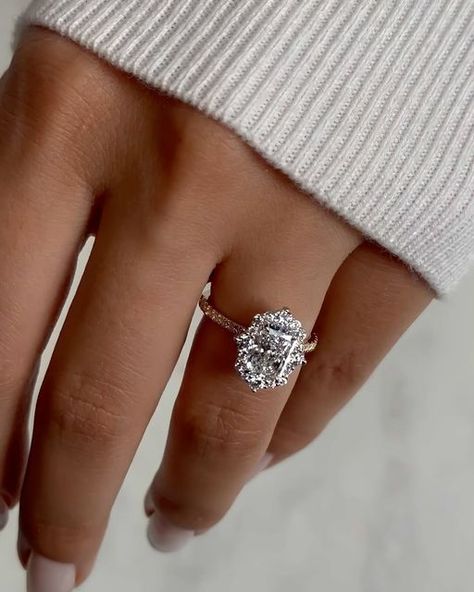 Nuno Rocha on Instagram: "Introducing this exquisite new @diamondboi engagement ring, a true masterpiece that seamlessly blends timeless elegance with contemporary allure. This stunning ring showcases a magnificent 1.70-carat radiant cut diamond, radiating brilliance and fire from every angle. Inspired by the opulence of the Victorian era, the ring boasts a modernized halo design, intricately crafted to enhance the diamond’s natural beauty. The halo is adorned with delicate Italian pave detailin The Victorian Era, Halo Design, Radiant Cut Diamond, Radiant Cut, Victorian Era, Timeless Elegance, Natural Beauty, Halo, Engagement Ring