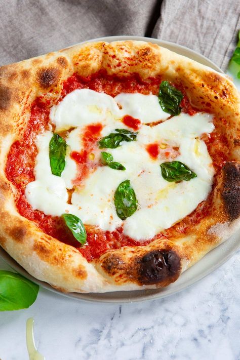 You'll feel like you're sitting in your favorite pizzeria when you eat this homemade pizza dough! #recipe #homemade #pizzeria #dough #pizza Bubble Pizza, Freeze Pizza Dough, Four Cheese Pizza, Margherita Pizza Recipe, Best Pizza Dough Recipe, Pasta Per Pizza, Neapolitan Pizza, Best Pizza Dough, Pizza Margherita