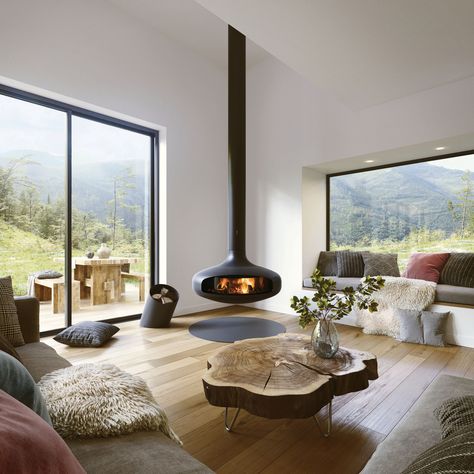 Glazed fireplaces designed by Focus | Dezeen Showroom Focus Fireplaces, Design Camino, Minimalist Fireplace, Contemporary Fireplace Designs, Suspended Fireplace, Hanging Fireplace, Floating Fireplace, Exterior Fireplace, Farmhouse Fireplace