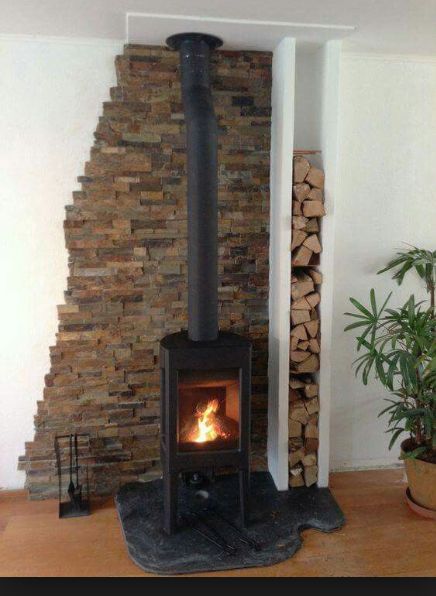 Wood Stove Surround, Wood Stove Hearth, Wood Stove Fireplace, Stucco Walls, Into The Wood, Fireplace Hearth, Pellet Stove, Log Burner, Diy Fireplace