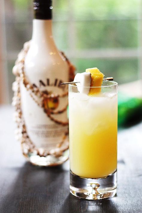 Coconut Pineapple Rum Drink | http://cookswithcocktails.com/coconut-pineapple-rum-drink/ Pineapple Rum Drinks, Coconut Rum Drinks, Fresh Coconut Water, Malibu Coconut, Pineapple Rum, Fresh Coconut, Rum Drinks, Coconut Rum, Pineapple Juice