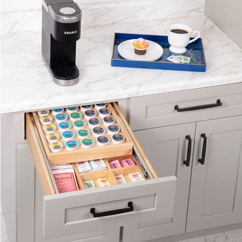 The Hardware Resources Double Coffee Drawer is a durable, solid birch organizer designed for coffee pods and accessories. It's compatible with Keurig and Nespresso Original pods, offering a streamlined morning experience. The top tray slides back to reveal the bottom tier, perfect for storing sugar, creamer, tea, and stir spoons. Shipped fully assembled, it can hold 40 pods or 40 original pods with support boards. Available in two sizes, it enhances your coffee experience with organization and elegance. Customers shopping at KitchenSource.com have the opportunity to receive exclusive discounts and complimentary delivery when they make purchases of $99 or more for Hardware Resources Drawer Inserts. Kitchen Cabinets With Hardware, K Cup Drawer, Coffee Drawer, Organize Your Kitchen Cabinets, Keurig Pods, Bar Renovation, Beverage Stations, Coffee Pods Drawer, Cup Drawer