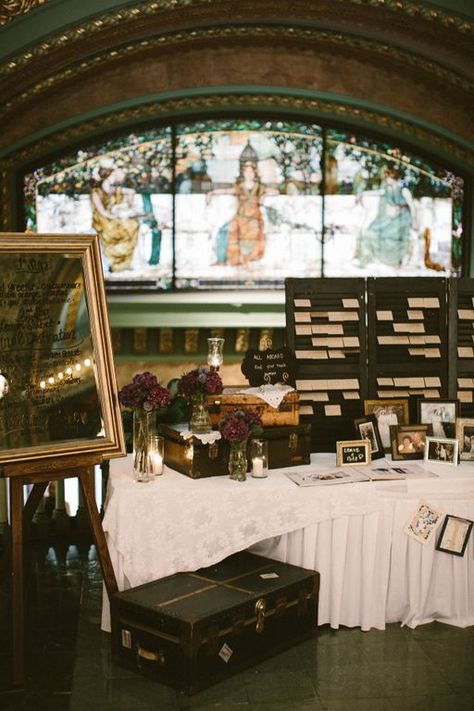 Welcome table and seating chart with vintage suitcases, trunks, and shutters. Travel themed vintage wedding at Union Station styled by Worn Vintage Rental.  Photos by MNC Photography. Trunk Wedding Decor, Wedding Welcome Table, Vintage Trunk, Soap Wedding Favors, Pink And White Weddings, Welcome Table, Train Wedding, Rustic Vintage Wedding, Vintage Suitcases