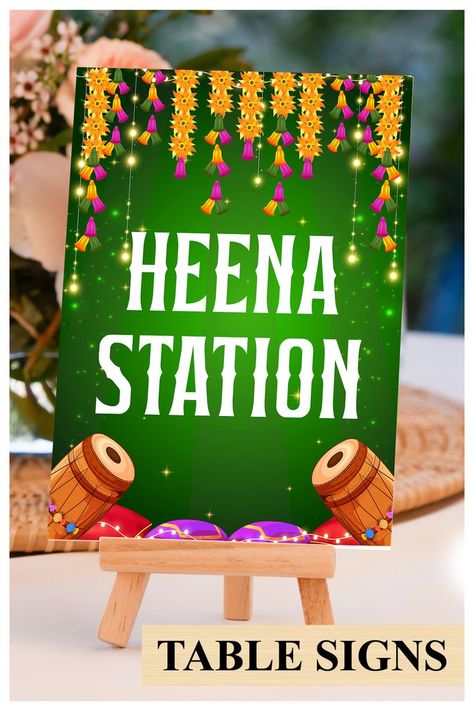 This beautiful Henna station sign or Indian wedding decor sign with mandala, from our Ethnic Fusion collection, lovingly created by us, is for those who would like to leave, not only a subtle, but also an impactful impression on their guests!

This DIY Henna station signs template or Jaggo decor as Dholki decoration, a fusion invite in traditional elegance, is complemented with indian colours & motifs, perfect for your Mehendi decoration Dholki Decoration, Henna Station, Decoration Indian Wedding, Mehndi Sign, Mehndi Decorations, Mehendi Decoration, Decor Indian Wedding, Indian Wedding Decor, Mehndi Decor