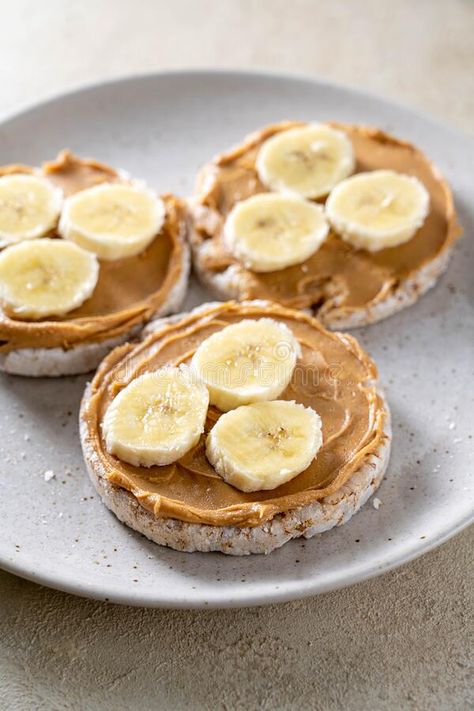 Rice cake with banana and peanut butter, healthy protein snack royalty free stock photo Peanut Butter Rice Cake, Healthy Rice Cakes, Peanut Butter Rice Cakes, Banana With Peanut Butter, Banana Peanut Butter Snack, Banana And Peanut Butter, Healthy Snacks Protein, Banana And Peanut Butter Snack, Rice Cake With Peanut Butter