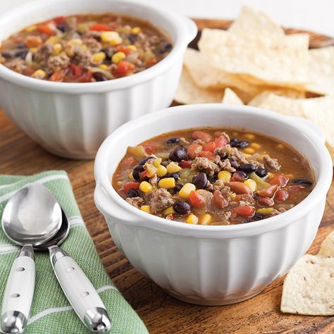 This Taco Soup is a filling combination of beef, black, corn, green chiles, and ranch style bean. Give it some extra flavor with your favorite cheese! Paula Deen Taco Soup, Ranch Style Beans, Black Beans Corn, Paula Deen Recipes, Taco Soup Recipe, Green Enchilada Sauce, Green Chiles, Taco Soup, Quick Weeknight Meals