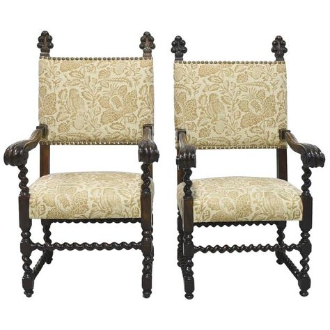 A fine pair of Jacobean Style throne chairs from the late 1800s with carved royal plumes, block and barley turnings, and upholstered back and seat. A very similar throne chair is seen in the new PBS series "Victoria" at Windsor castle when Victoria is being introduced to the lords and ladies prior to her coronation. Chairs are beautifully upholstered with Fine fabric and decorative brass nails. English or Flemish, circa 1860. Jacobean Furniture, White Leather Armchair, Exterior Stair Railing, Lords And Ladies, Hollywood Regency Interior, Black Velvet Chair, Throne Chairs, Jacobean Style, Black Leather Armchair