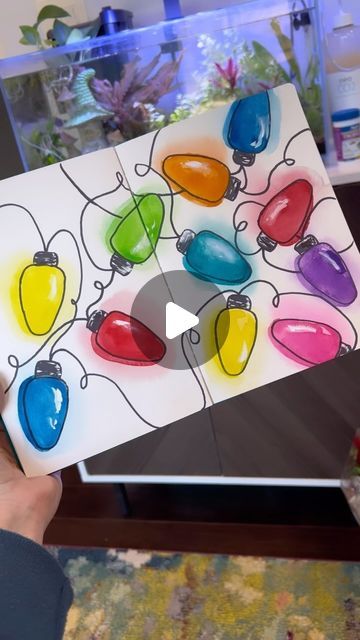 Andrea Nelson on Instagram: "This one can totally be simplified if you dont want to make them glowy! Just draw the lights and fill them in. Done!  Supplies are on my page: My student watercolor set My sketchbook My size 8 round brush Sharpie Dr Martin’s bleed proof white  #holidayart #christmasdiy #holidaycard #holidaywatercolor #easyart #blobart" Beginner Watercolour, Andrea Nelson Art, Watercolor Christmas Cards Diy, Watercolor Holiday Cards, Holiday Chaos, Craft Work For Kids, Learn Watercolor Painting, Messy Art, Watercolor Beginner