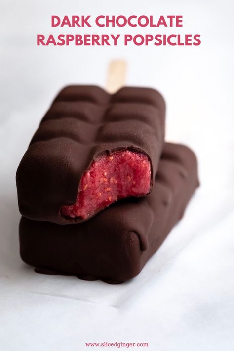 These simple 3 ingredient popsicles are bursting with fresh sweet raspberries! Made with 100% pure fruit and dipped in dark chocolate they are a delicious and healthy treat! Vegan, gluten free and no added sugar. Sliced Ginger, Ice Cream Bar Recipe, Raspberry Popsicles, Raspberry Dark Chocolate, Summer Dessert Ideas, Dark Chocolate Raspberry, Sugar Free Ice Cream, Raspberry Jelly, Yogurt Pops