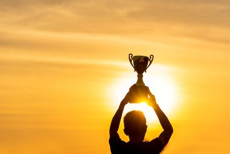 Silhouette of a winning man holding gold... | Premium Photo #Freepik #photo #champion #award-winning #trophy #trophy-cup Trophy Photography, Message Background, Winning Trophy, Champion Trophy, Golf Trophies, Football Trophies, Football Awards, Box Project, Trophy Cup