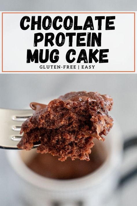 This pin shows a close up picture of the chocolate mug cake displayed on a fork with the decorative cup behind it. Protein Mug Cake Microwave, Mug Cake Protein Powder, Mug Cake Microwave Recipe, Protien Mug Cake, Clean Eating Deserts, Chocolate Protein Mug Cake, Low Calorie Sweets, Cake Microwave, Protein Mug Cake