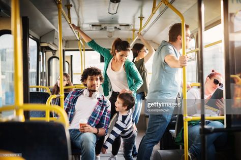 Stock Photo : Young mother and her son are training not to fall in a bus full of people. Charter Bus, Team Theme, Party Bus Rental, Chartered Bus, Government Services, Senior Trip, Great Place To Work, Mini Bus, Party Bus