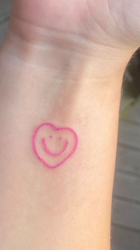 Smiley Heart Tattoo, Cute Pink Tattoos, Eeaao Tattoos, Pink Tattoo Ideas, Pink Heart Tattoo, Cute Heart Tattoos, Pink Ink Tattoo, Pink Tattoo Ink, Dr Tattoo