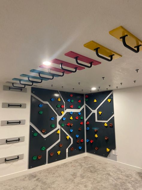 Basement Rock Wall Indoor Climbing, Basement Playground Diy, Basement Climbing Gym For Kids, Kids Indoor Climbing Ideas, Diy Kids Climbing Wall, Basement Climbing Wall For Kids, Indoor Climbing Wall For Kids, Rock Wall Playroom, Diy Rock Wall For Kids