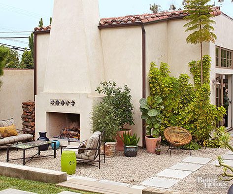 You'll find gravel in shades of brown, gray, white, gold, rust, and as color mixtures. For a naturally pleasing look, select lighter hued pebbles that coordinate with your home's exterior color palette. Gravel Patios, Gravel Patio Ideas, Outdoor Fireplace Ideas, Patio Edging, Pea Gravel Patio, Concrete Patios, Outdoor Fireplace Designs, Gravel Patio, Mediterranean Landscaping