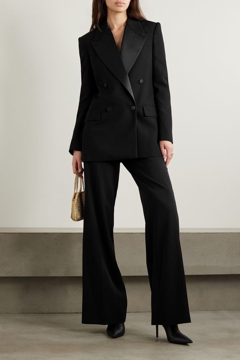 Elegant and refined, Stella McCartney's blazer takes cues from classic tuxedos - the designer was trained in traditional British fashion so, naturally, she cuts a sharp suit. Tailored from grain de poudre wool, it has satin peak lapels and double-breasted buttons. Black Satin Pant Suit, All Black Suit Women, Fem Suit, Modern Suits For Women, Double Breasted Suit Women, Blazer Pants Outfit, Women Suits Prom Classy, Woman Black Suit, Tailored Suit Women