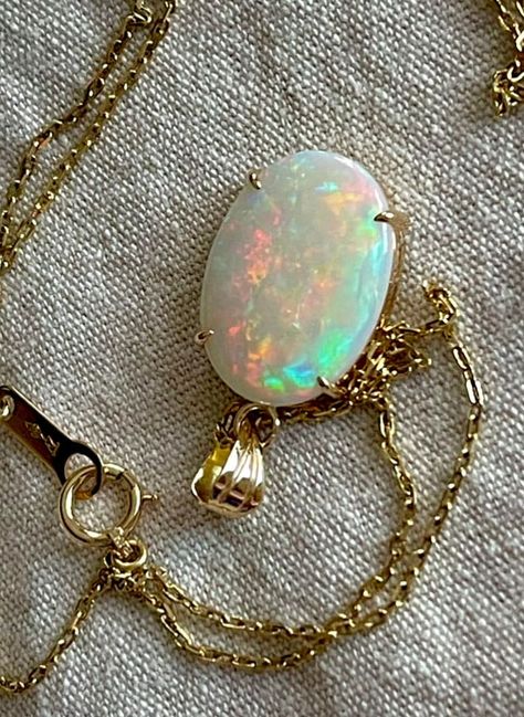 this is super beautiful item and in excellent as new condition! fantastic quality! You will absolutely love it!!  Solid Australian Opal is set in solid 18k yellow gold - opal is solid Australian and not doublet not triplet.  as with most opals the colors are stronger on the Sun and direct indoor light and not so in a dark/low light. please note this opal shows the best fire when looked upsidedown as shown on photos. the opal has no cracks, no crazing, no scratches! Excellent condition! Comes wit Australian Opal Necklace, Opal Gold Necklace, Opal Necklace Vintage, Opal Necklace Pendant, Opal Necklace Gold, Ethiopian Opal Jewelry, Australian Opal Jewelry, 18k Gold Chain, Opal Pendant Necklace