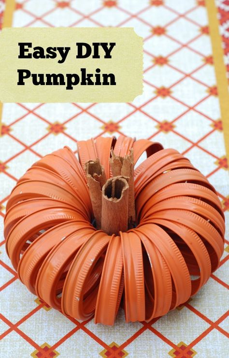 Easy DIY Pumpkin Canning Lid Pumpkin, Jar Lid Crafts, Diy Pumpkins Crafts, Canning Jar Lids, Creative Pumpkins, Canning Jar, Diy Pumpkin, Pumpkin Crafts, Fall And Halloween