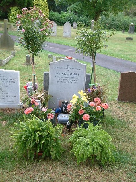 Beautiful Graveyards and cemeteries of England UK | The understated grave of Brian Jones, founding member of the Rolling Stones, in Cheltenham Cemetery | Facebook Brian Jones, Container Gardening Flowers, England Uk, Mulch, Amazing Flowers, Rolling Stones, Container Gardening, Cemetery, Garden Sculpture