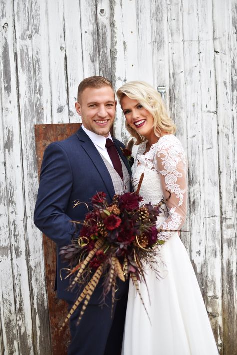 Wedding Feather Bouquets, Bride Bouquets With Feathers, Bridal Bouquet Pheasant Feathers, Pheasant Feathers Wedding, Pheasant Feather Bouquet, Pheasant Feather Wedding, Blue Suit Groom, Bouquet With Feathers, Fall Wedding Gowns