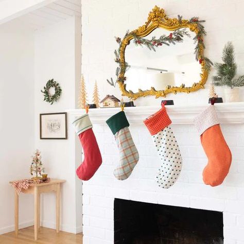 Funky Christmas Stocking, Anthropologie Stocking, Christmas Stockings Bright Colors, Boucle Christmas Stocking, Gingham Christmas Stocking, Schoolhouse Pendant Light, Schoolhouse Lighting, Orange Pomanders, Holiday Mantel Decor