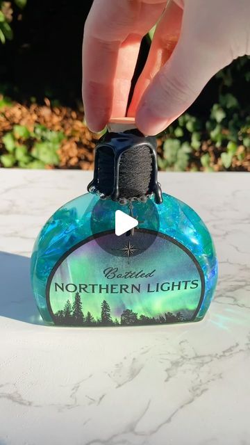 Forbidden Forest Apothecary on Instagram: "Northern Lights ✨🩵✨🩵✨🩵✨🩵✨ Magical, decorative, color changing potion bottles available in my shop!  #potion #potions #fantasy #art #magic #smallbusiness #smallbusinessowner #bookshelfdecor #potionbottle" Color Changing Potion Diy, Forest Apothecary, Diy Potions, Potion Maker, Color Changing Potion, Magic Potion Bottles, Crow Moon, Bottle Decorations, Teen Crafts