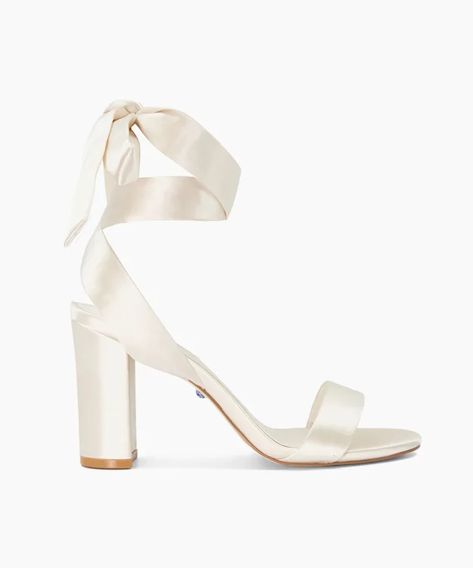 https://www.dunelondon.com/marnies-block-heel-ankle-tie-satin-wedding-shoes-ivory-1312503940122513.html Prom Shoes Aesthetic, White Satin Shoes, Debutante Shoes, White Satin Heels, Heels For Homecoming, White Heels Aesthetic, White Heels With Bow, White Formal Shoes, Formal Shoes Women