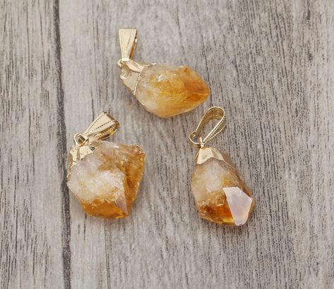 "Natural Citrine Crystal Pendant with Gold Bail for Necklace Jewelry Details: ❤Size:Pendant measures around 0.4\"-0.8\" x 1.3\"-1.4\" （include bail）,if you need bigger size pls noted us. These are raw natural citrine stones ❤Qty: 1 pcs，these citrines are very gorgeous，they can use to make necklace, bracelets，earrings or for your other projects.，and you can wear it every occasion ❤Color：yellow Each citrine pendant is a natural uncut piece so there may be variations in color,size,shape Citrine is Raw Citrine, Quartz Crystal Pendant, Citrine Pendant, Citrine Stone, Citrine Crystal, Natural Citrine, Bring Happiness, Crystal Quartz, Quartz Pendant