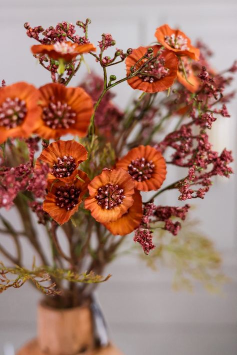 These faux florals provide the perfect touch of autumn to any room! The rust colored flowers add a warm pop of color and a touch of charm. Perfect for adding a seasonal touch to your home decor this fall! Dimensions: 16 x 9 x 3.5" Flower Bundle, Fall Dinner Party, Fall Flower, Fall Dinner, Colored Flowers, Ap Art, Faux Florals, Rust Color, Fall Floral