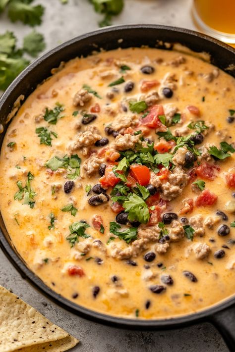 Cowboy Queso Dip Turkey Queso Dip, Monterey Jack Queso, Chili’s Skillet Queso Recipe Crockpot, Queso Chip Dip, Cowboy Party Appetizers, Beer Cheese Queso, Western Appetizers Parties Food, Christmas Queso Dip, Cowboy Bean Dip