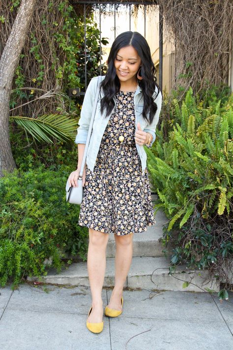 Black Floral Dress + Denim Jacket + Yellow Flats + Grey Crossbody Bag Black Denim Jacket Dress Outfit, Floral Dress And Denim Jacket Outfit, Summer Dress With Jacket, Walk Outfit, How To Wear Flats, Black Floral Print Dress, Yellow Flats, Dress With Jacket, Denim Jacket With Dress