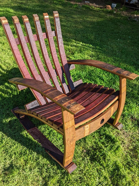 Our chairs are crafted using recycled French oak wine barrels from California's wineries. Each barrel stave is purposefully chosen to build a comfortable & functional piece of art that you will enjoy for years to come.  All staves are sanded prior to assembly to ensure a smooth and finished product.   Size of assembled chair about: 36 in tall x 35 in long x 29 in wide  Check out our store link for more details! https://timber2art.etsy.com/listing/1495273285/wine-barrel-rocking-adirondack-chair Barrel Ideas, Adirondack Rocking Chair, California Winery, Barrel Stave, Wine Barrels, Wine Barrel, French Oak, Lazy Susan, Adirondack Chair