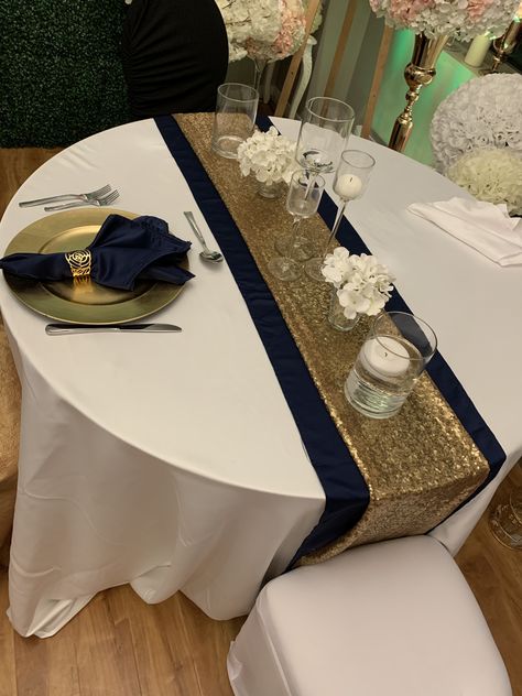 Navy blue and gold table setting glam decor sequins candles Navy Blue And Gold 50th Anniversary, Black Navy Gold Table Setting, Navy And Gold Anniversary Party, Navy Blue Gold And White Table Setting, Navy Blue And Gold 60th Birthday, Table Setting 50th Birthday, Diy Gold Table Decor, Navy Blue White And Gold Birthday Party, Black Blue And Gold Party Table Settings