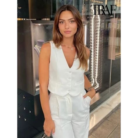 Just found this amazing item on AliExpress. Check it out! $10.48 57％ Off | TRAF Women Fashion Front Button Asymmetric Waistcoat Vintage V Neck Sleeveless Female Outerwear Chic Vest Tops Stylish Waistcoats, Simple Streetwear, White Waistcoat, Streetwear Coat, Short Vest, Slim Trousers, Cropped Vest, Cardigan Outfits, Clothing Details