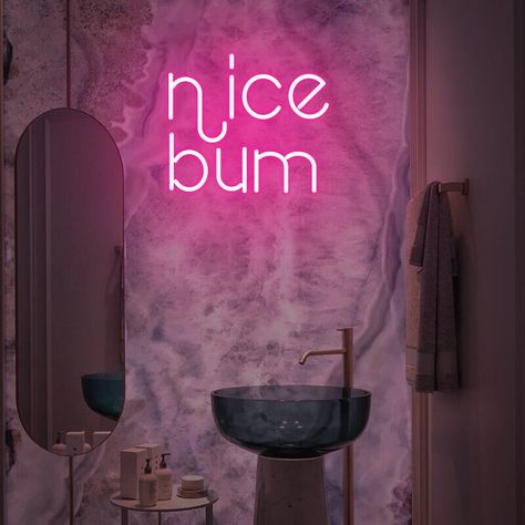 Nice Bum Neon Sign, a fun and colorful piece of wall decor that adds a touch of humor and playfulness to your bathroom, bedroom, or gallery wall. This neon sign features the word "Nice Bum" in a vibrant pink color, creating a cheerful and eye-catching display. The "Nice Bum" Neon Sign is the perfect addition to your bathroom or bedroom decor if you're looking for a fun and lighthearted touch. Its bright neon lights bring the sign to life, adding a vibrant glow that enhances the ambiance and crea Funny Neon Signs, Bedroom Colourful, Colourful Gallery Wall, Fun Art Print, Sign For Bedroom, Red Quotes, Pink Neon Sign, Funny Bathroom Art, Quote Decor