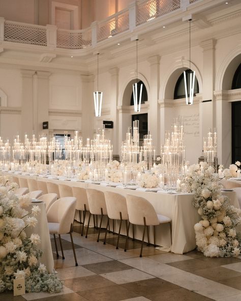 Still swooning over Bella & Steven’s reception at Post ✨ Champagne Wedding Reception Decor, Wedding Reception White Chairs, Runway Seating Wedding, Wedding Long Table Centerpieces, High Centerpiece Wedding, Big Wedding Reception, Wedding Ceremony Aisle Flowers, Wedding Candle Centerpieces, Outdoor Night Wedding