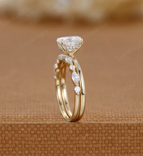 2ct Oval Moissanite Engagement Ring Set Yellow Gold Diamond - Etsy Wedding Band Plus Engagement Ring, Circle Shaped Engagement Rings, Wedding Ring Sets Oval Diamond, Oval Wedding Ring Set Gold Band, Women’s Gold Wedding Ring, Oval Cluster Engagement Ring With Wedding Band, Rose Gold Vs Yellow Gold, Wedding Bands To Go With Oval Ring, Yellow Gold Solitaire Engagement Ring With Wedding Band